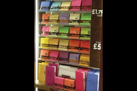 Thorntons’ Birmingham shop has succeeded in departing from the norm of pastel-led interiors to concentrate on gifting ideas